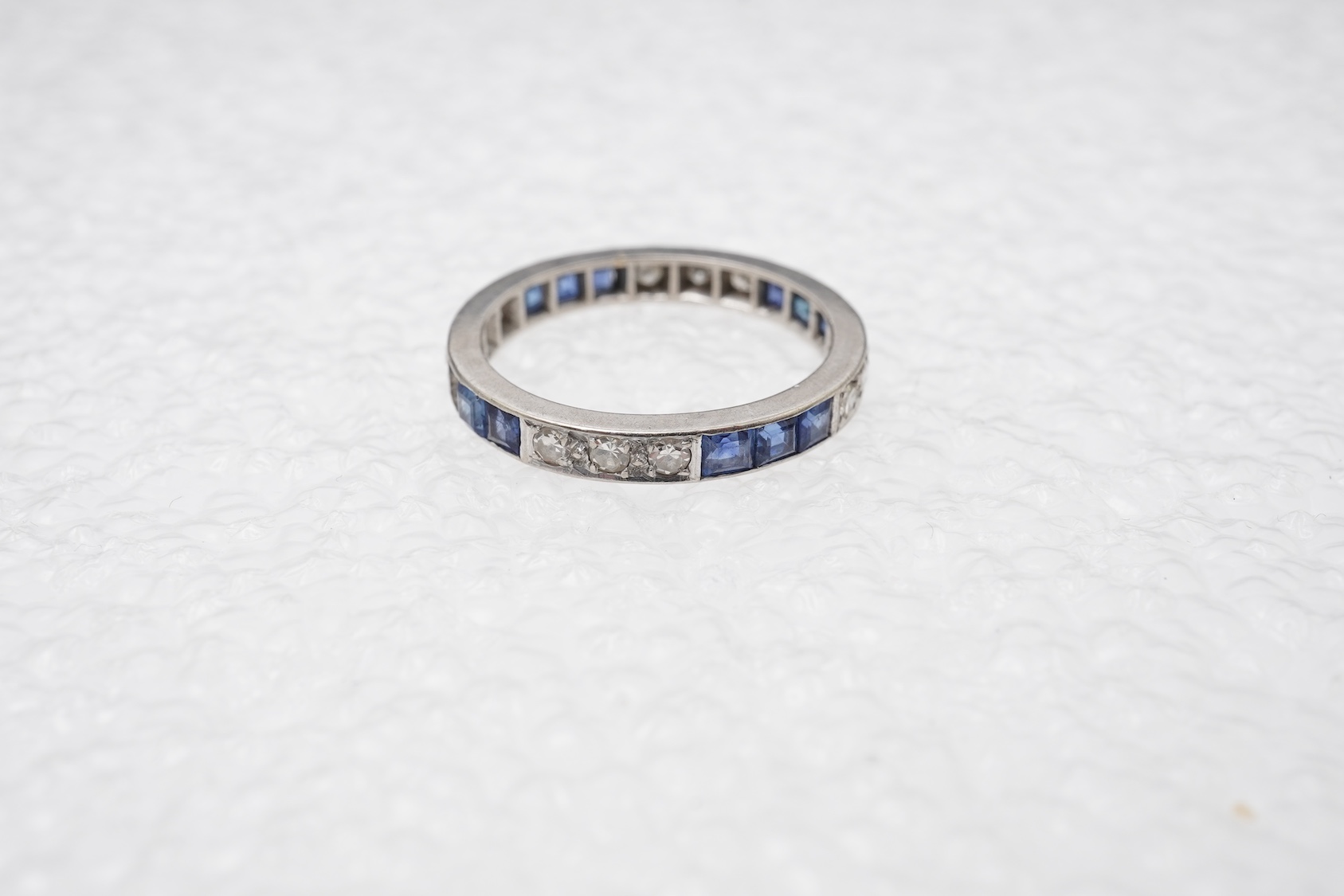 An Art Deco sapphire and diamond eternity ring, 1930s